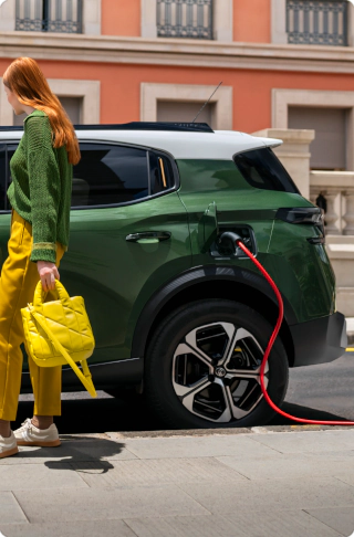 Side charging view of Citroën ë‑C3 Aircross electric SUV showcasing easy plug‑in access for convenient, efficient and affordable mobility.