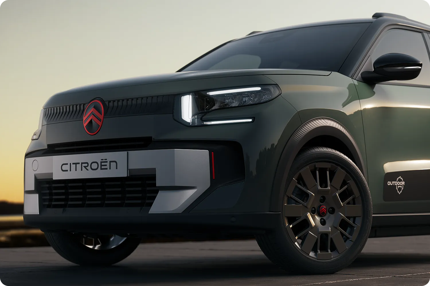 Zbliżenie na przednie koło Citroëna C3 Outdoor, solidnego, wszechstronnego i komfortowego modelu o innowacyjnym designie, stworzonego z myślą o codziennych podróżach