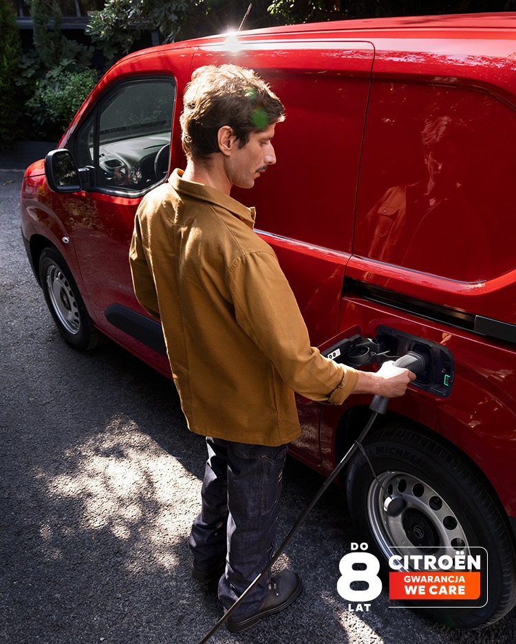Man charging his red new ë-Berlingo Van